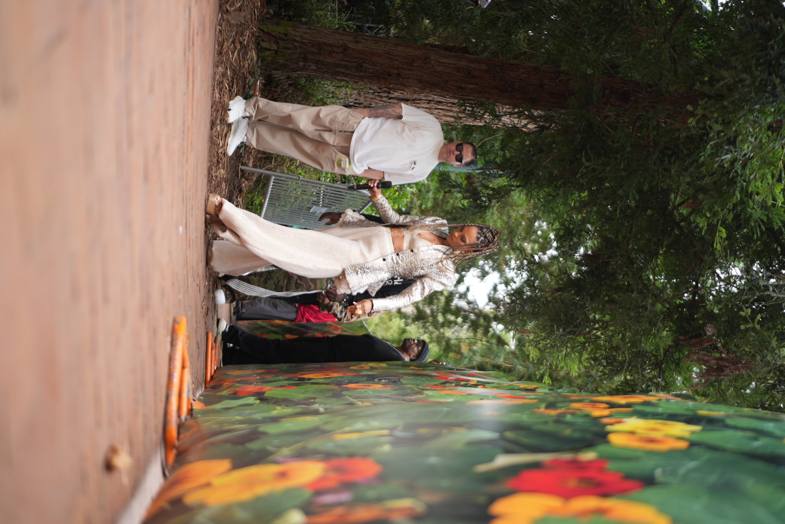 Goapele walking to the stage in a metallic jacket at Stern Grove Festival